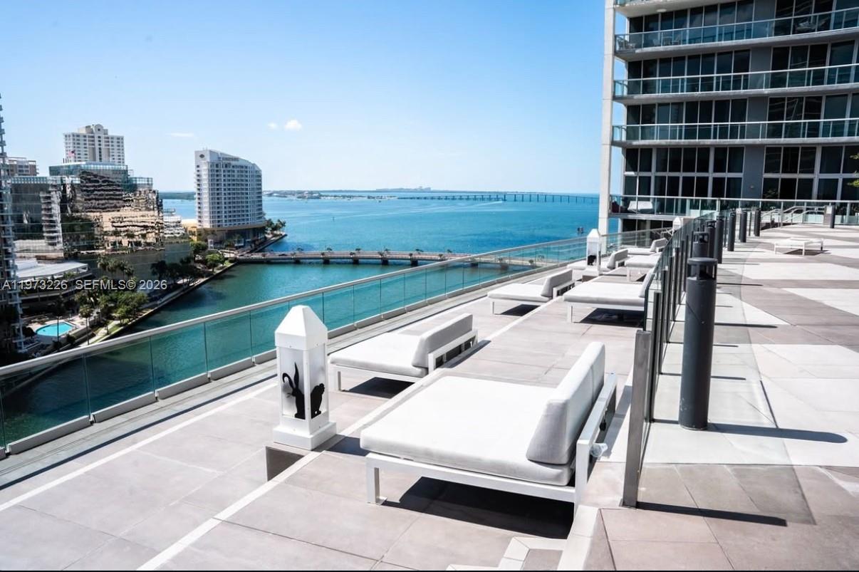 495 Brickell Avenue, Unit 1403 Miami, FL 33131 - Photo 42 of 48 a view of swimming pool with outdoor seating and city view