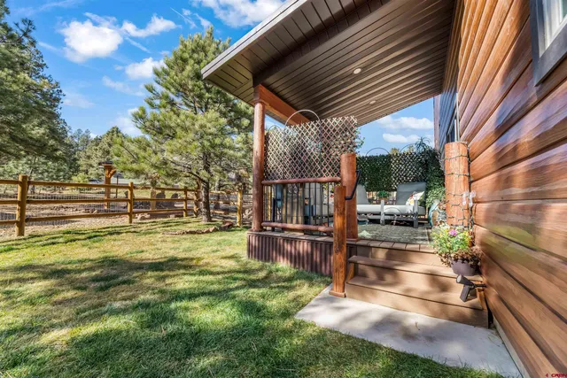 a view of yard with outdoor seating