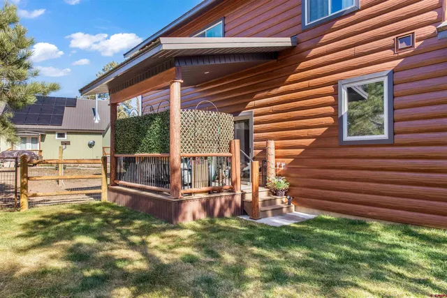 a view of backyard with deck