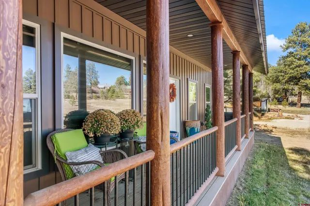 a view of a porch with furniture