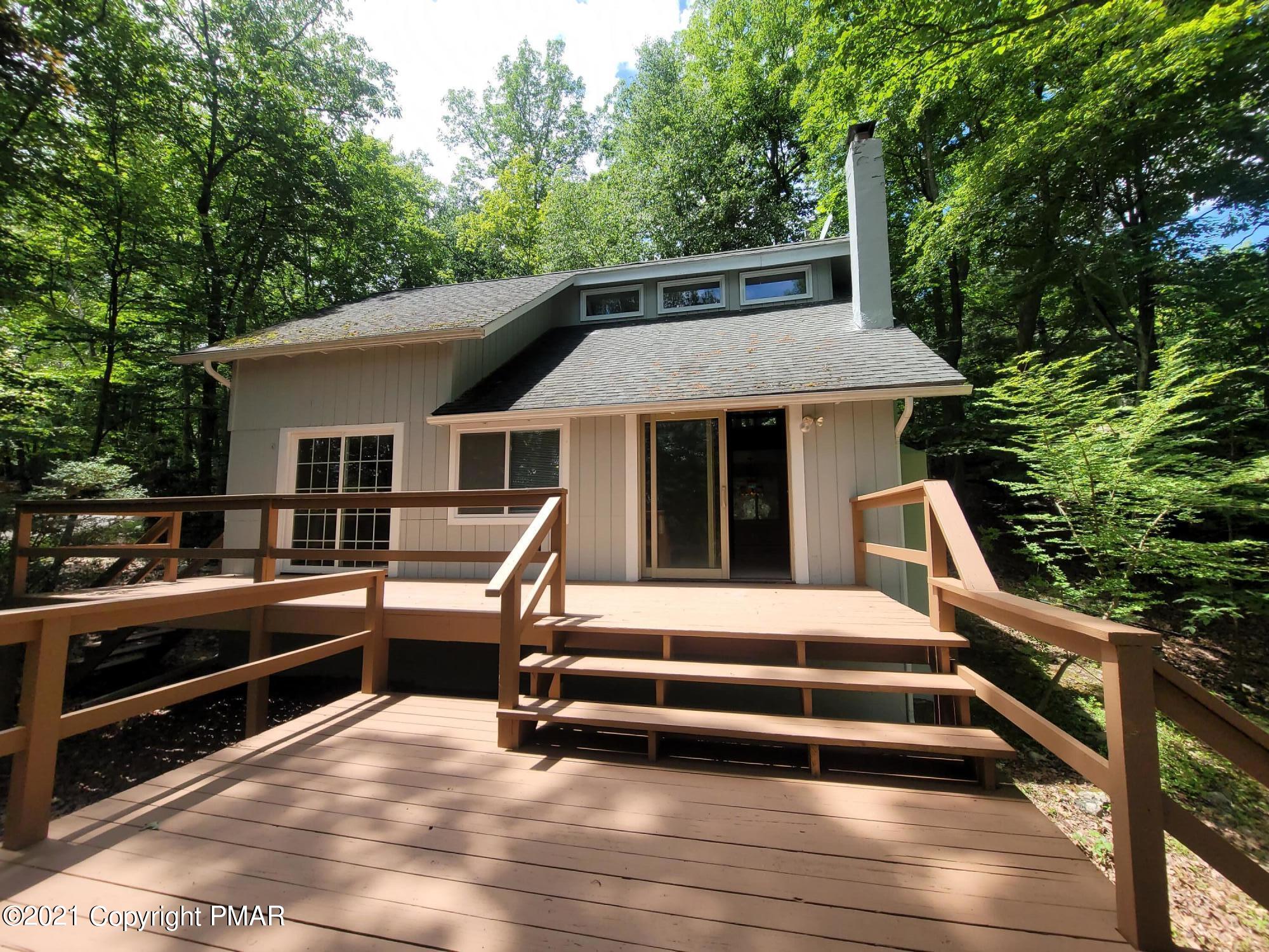 3153 Cherry Ridge Road Bushkill, PA 18324 - Photo 1 of 41 a view of house with roof deck and seating space