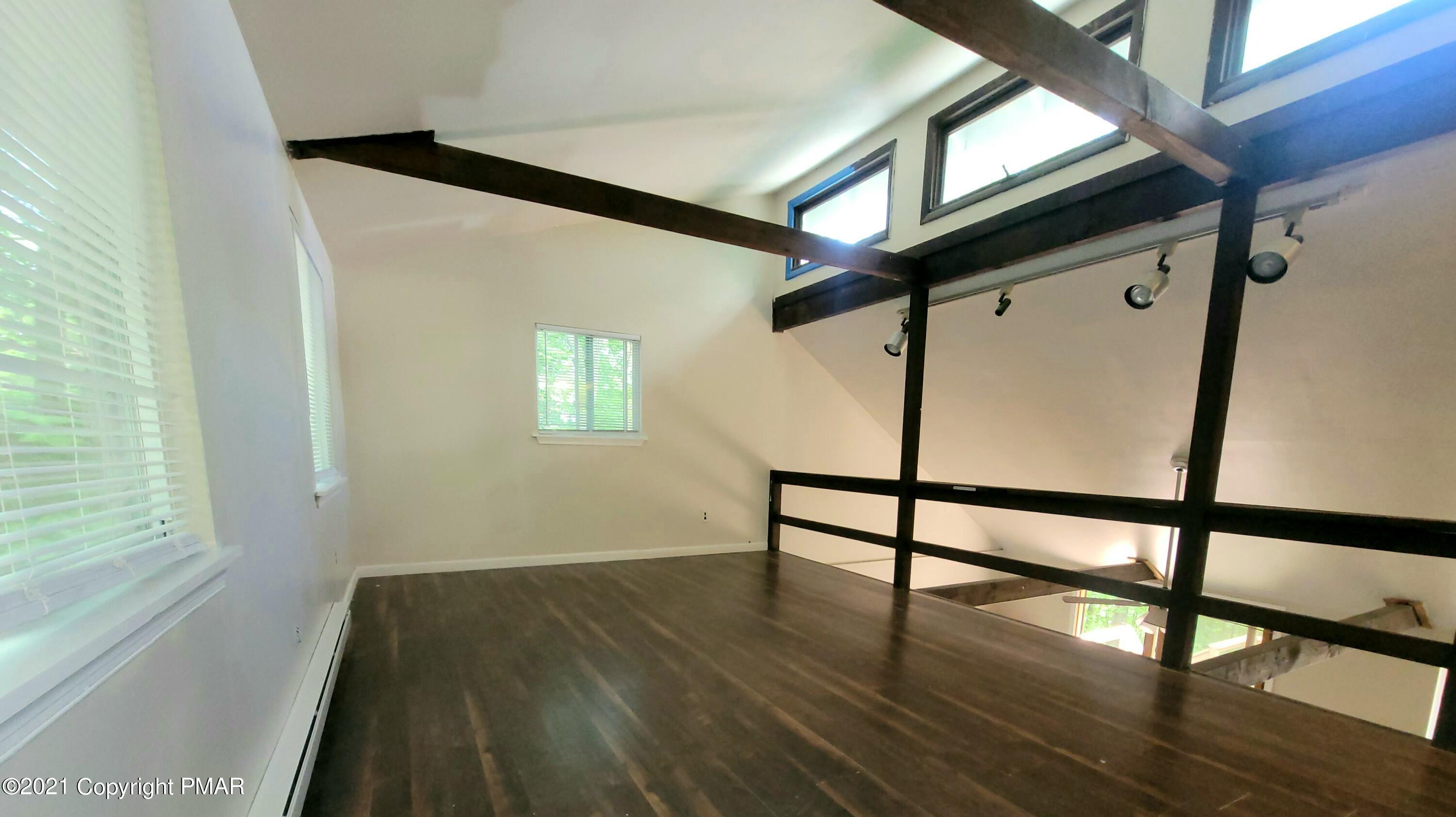 3153 Cherry Ridge Road Bushkill, PA 18324 - Photo 13 of 41 a view of entryway with wooden floor