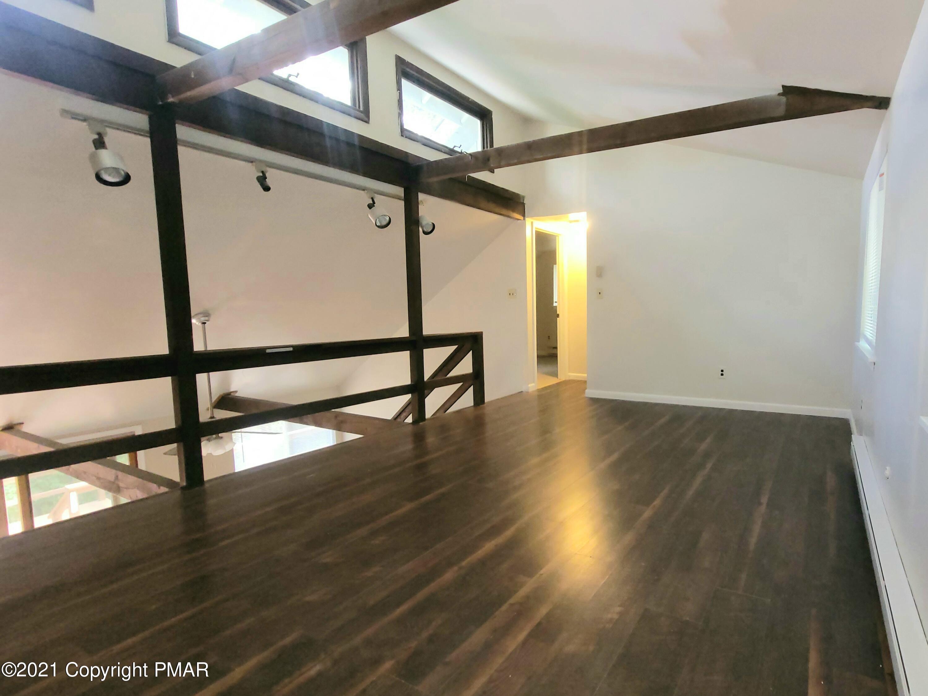 3153 Cherry Ridge Road Bushkill, PA 18324 - Photo 16 of 41 a view of entryway with wooden floor