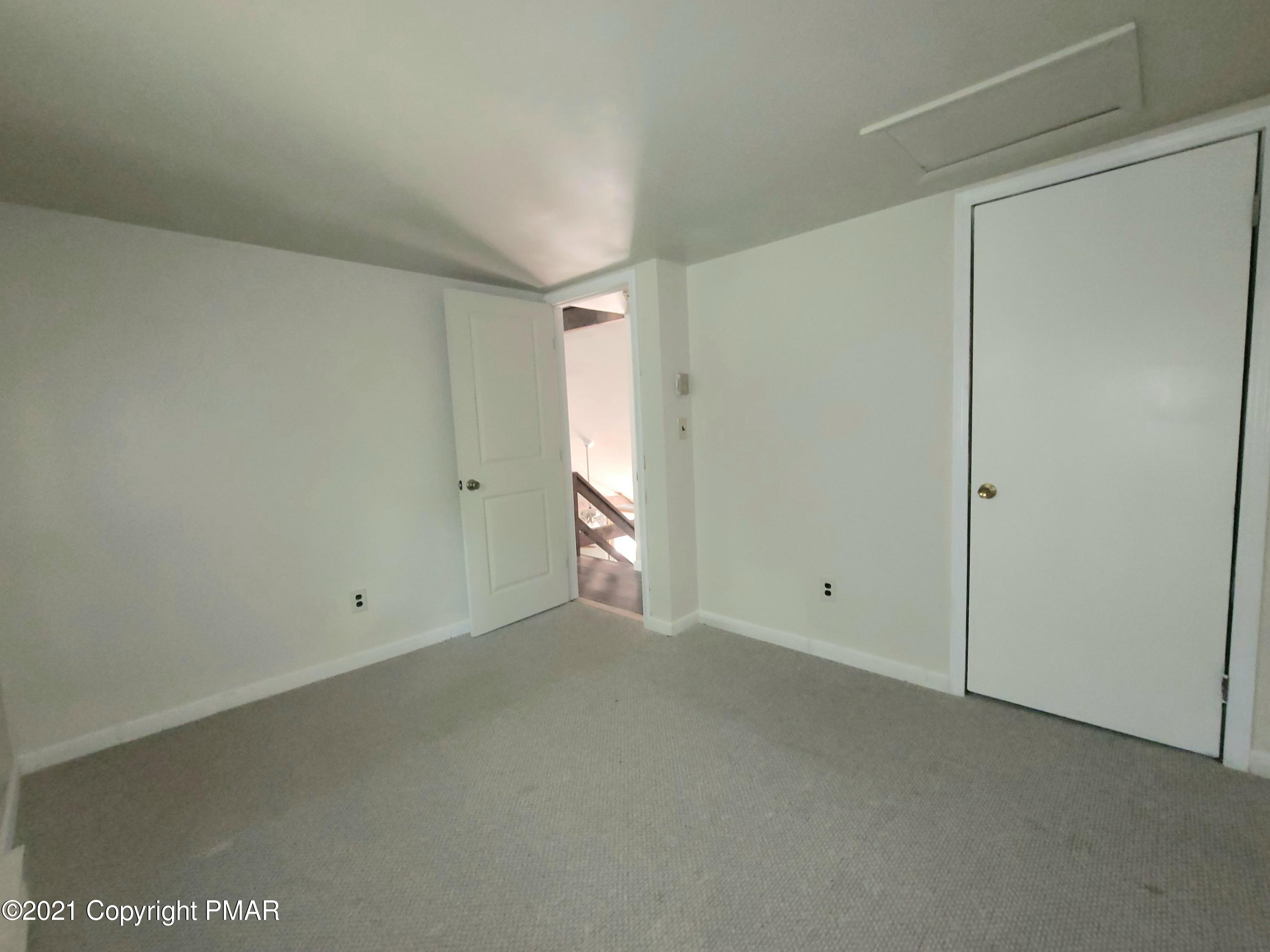 3153 Cherry Ridge Road Bushkill, PA 18324 - Photo 19 of 41 an empty room with an entryway