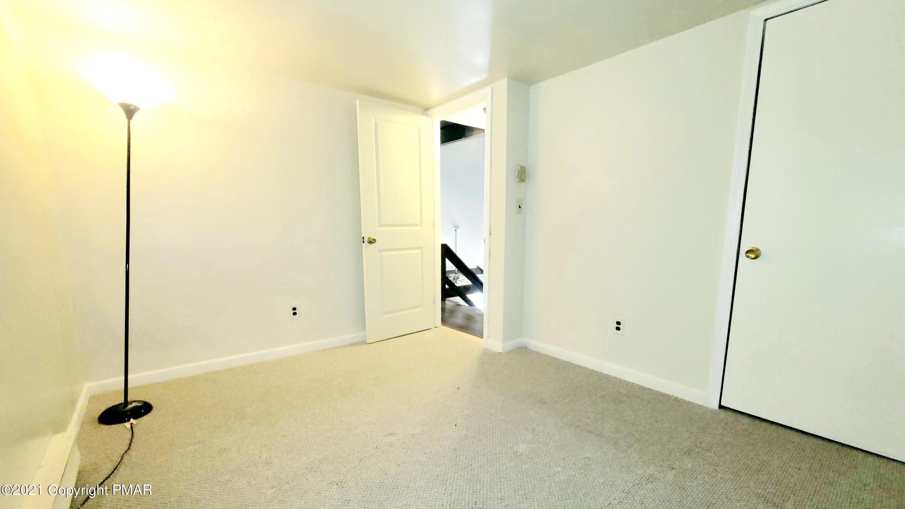 3153 Cherry Ridge Road Bushkill, PA 18324 - Photo 20 of 41 a view of a room with a door