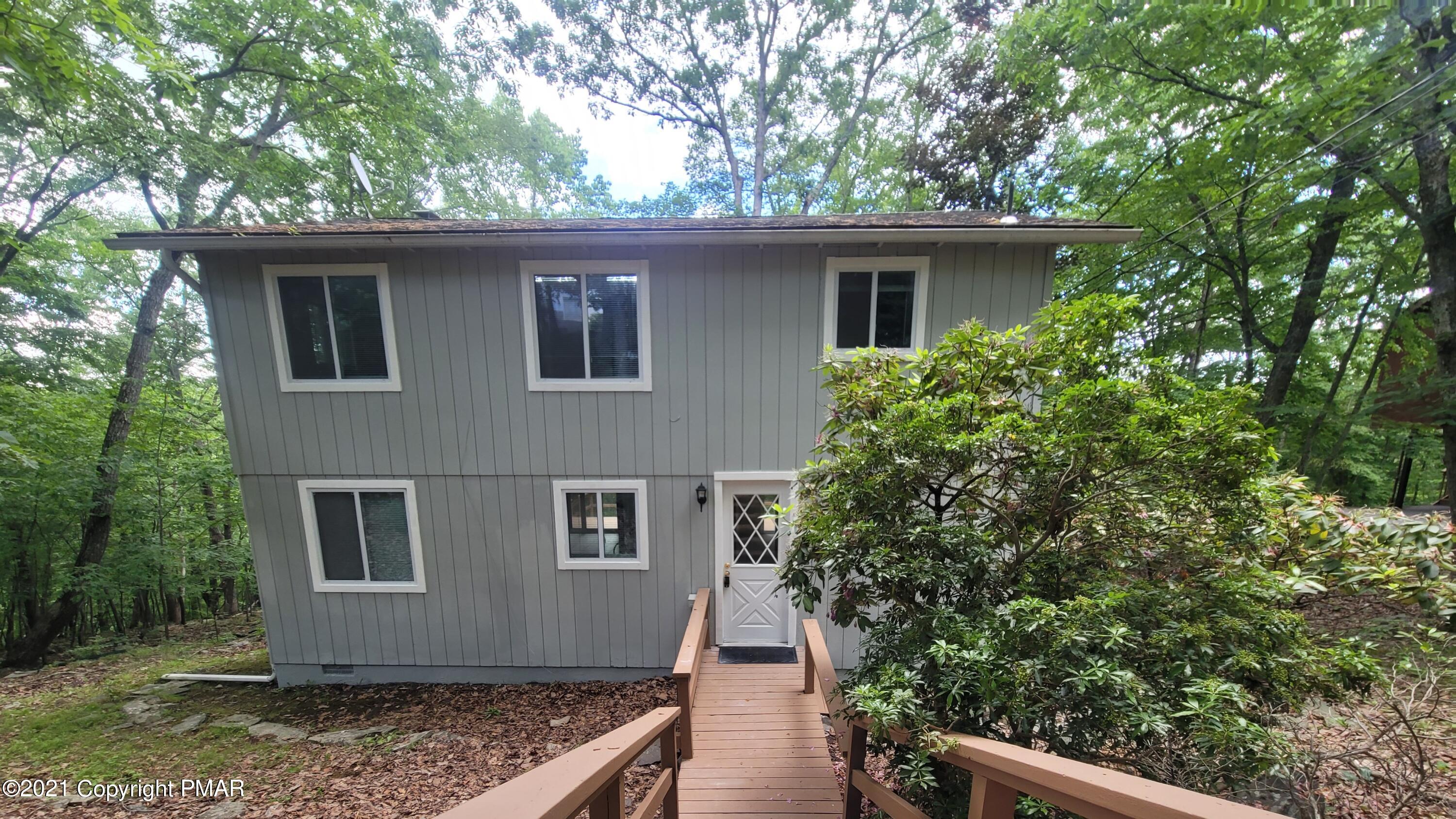 3153 Cherry Ridge Road Bushkill, PA 18324 - Photo 2 of 41 a view of a house with a yard