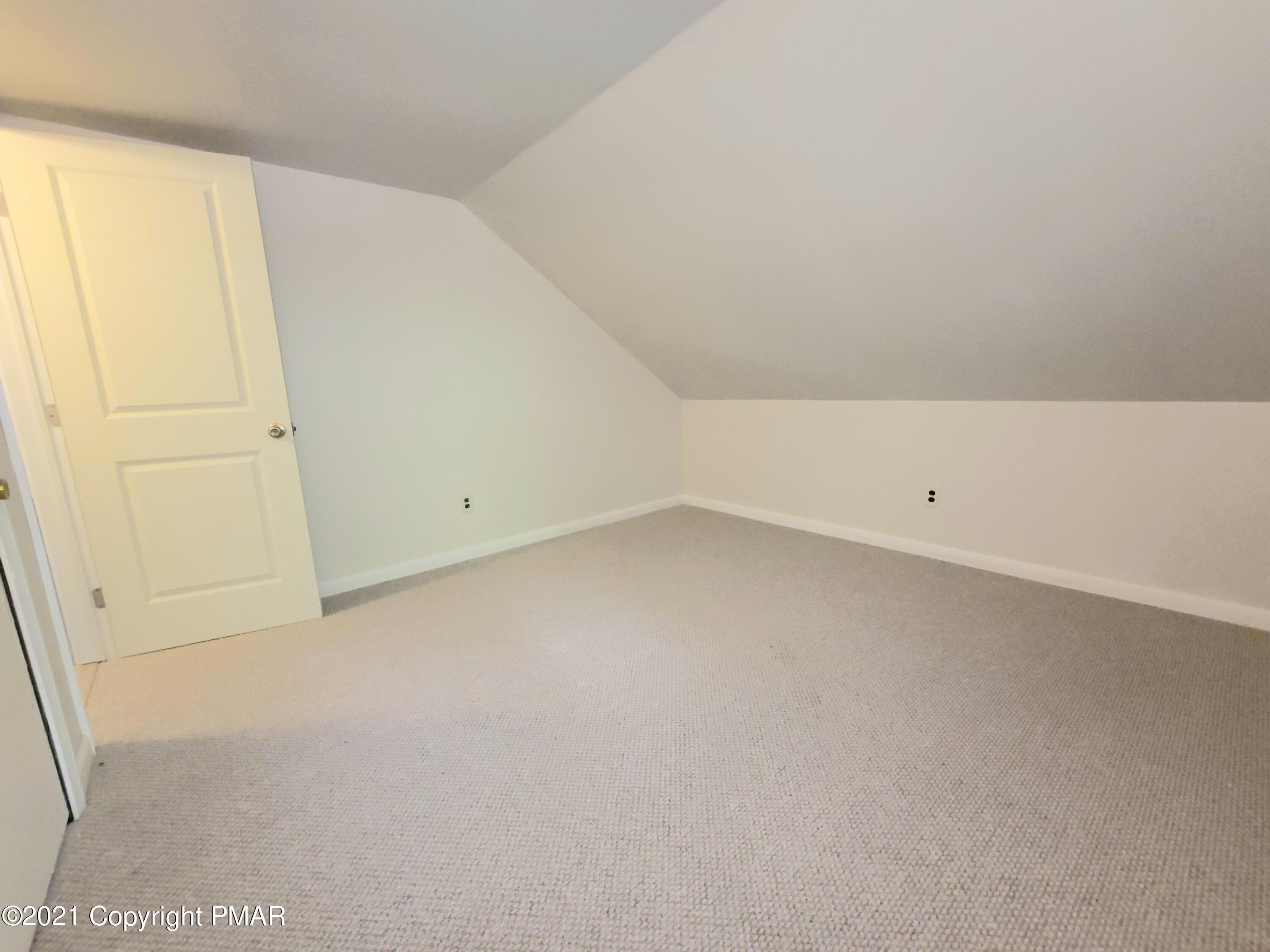 3153 Cherry Ridge Road Bushkill, PA 18324 - Photo 21 of 41 an empty room with an entryway