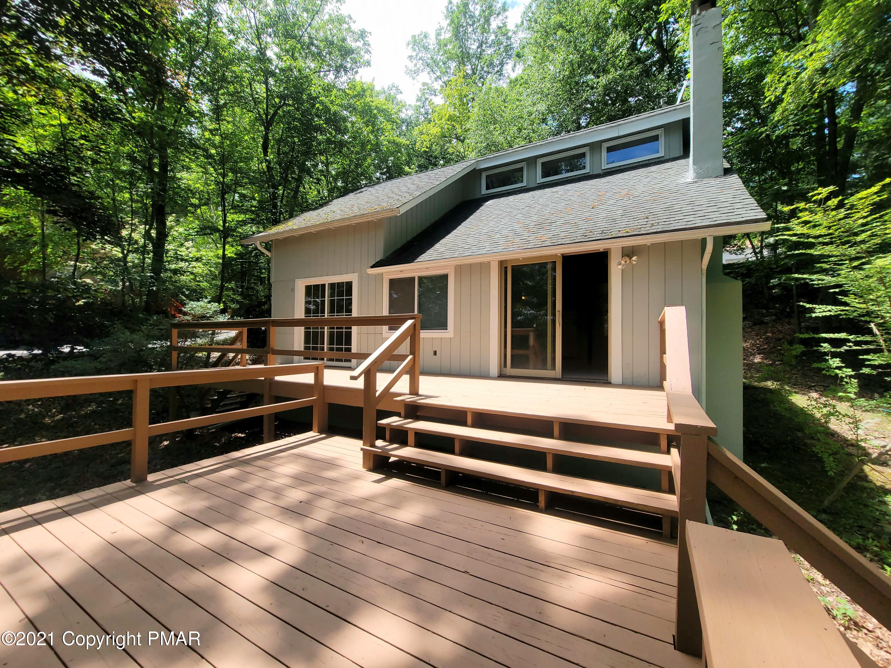3153 Cherry Ridge Road Bushkill, PA 18324 - Photo 24 of 41 a view of outdoor space yard deck and outdoor seating