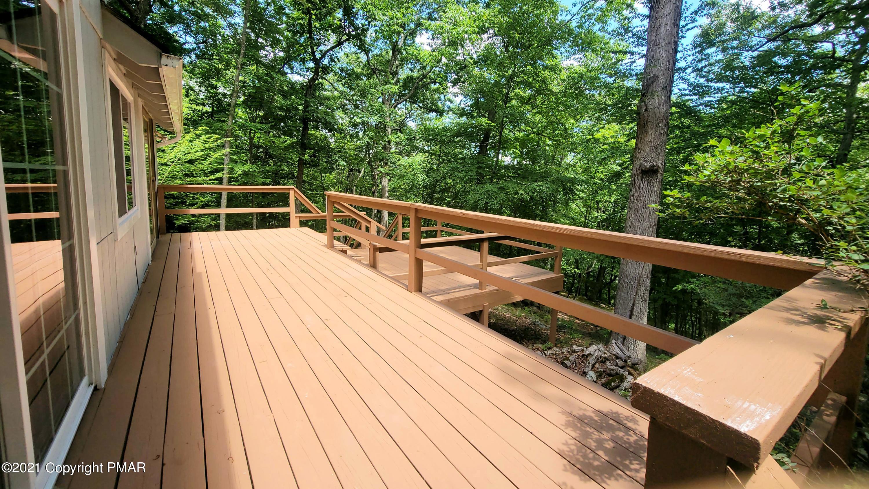 3153 Cherry Ridge Road Bushkill, PA 18324 - Photo 32 of 41 a view of balcony with deck and wooden floor