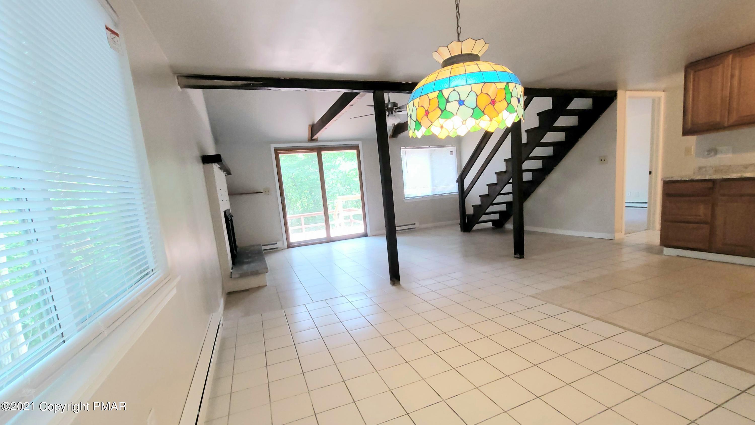 3153 Cherry Ridge Road Bushkill, PA 18324 - Photo 5 of 41 a view of entryway with stairs and furniture