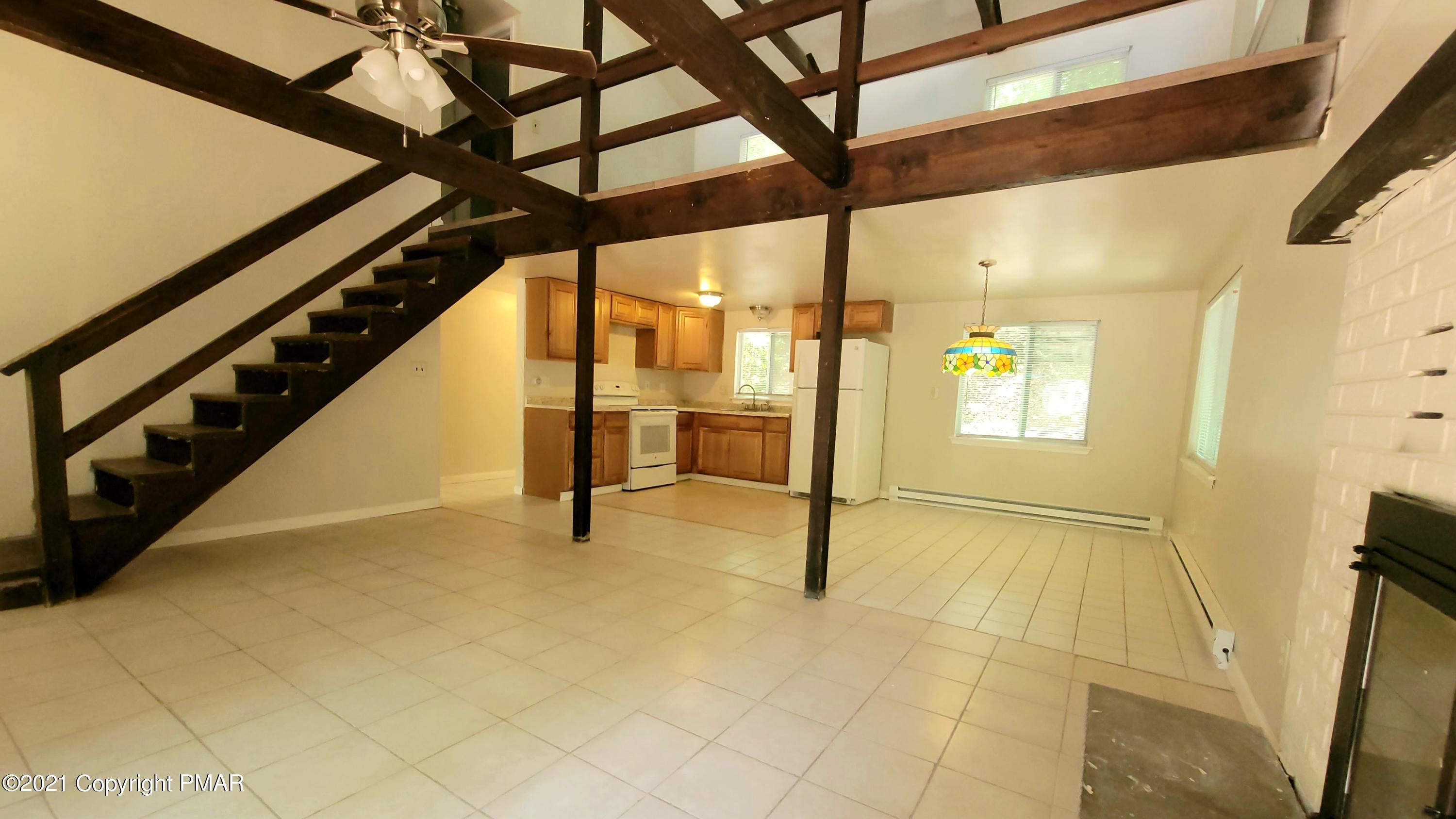 3153 Cherry Ridge Road Bushkill, PA 18324 - Photo 6 of 41 a view of an empty room with windows
