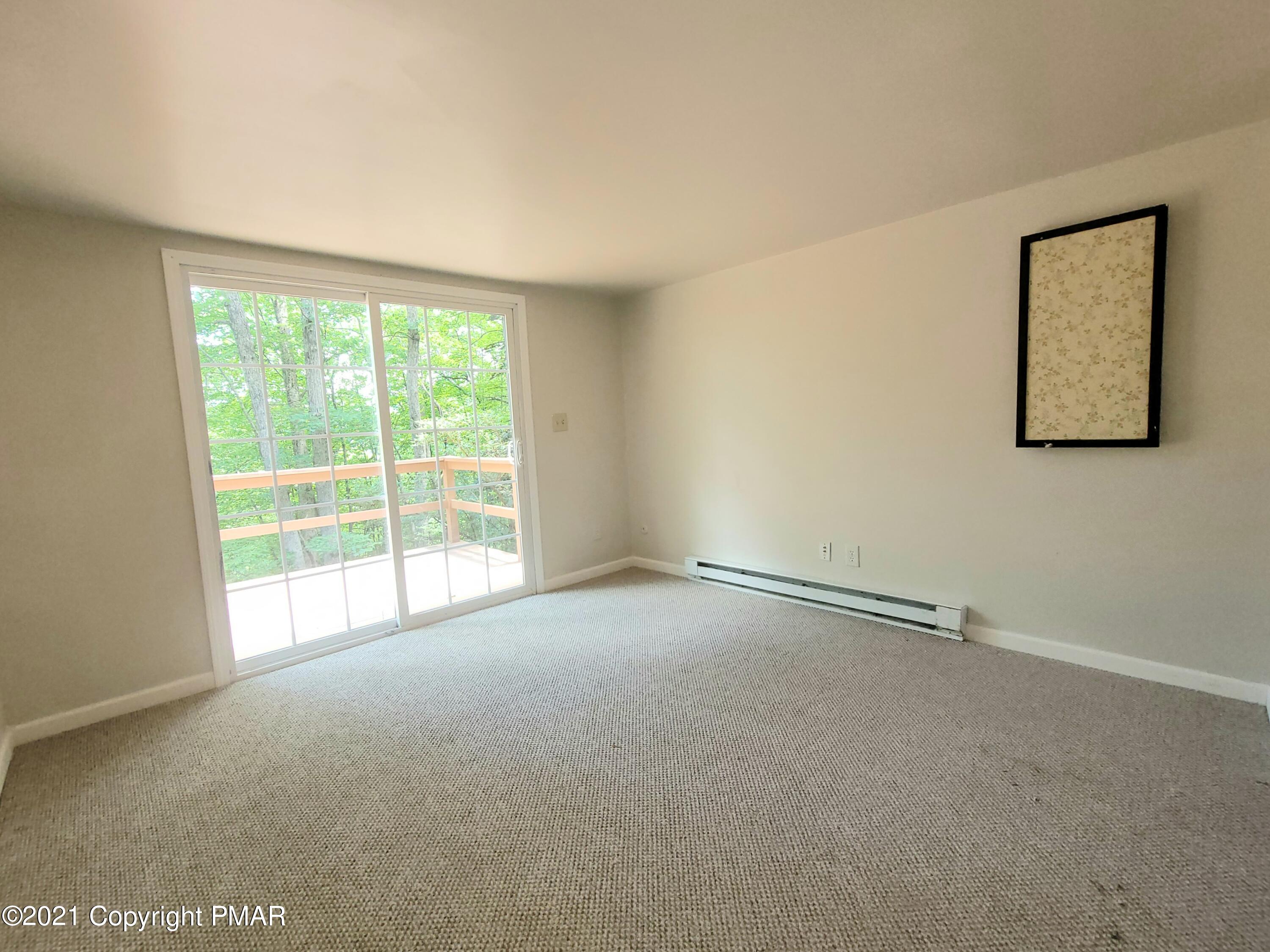 3153 Cherry Ridge Road Bushkill, PA 18324 - Photo 8 of 41 a view of an empty room with a window