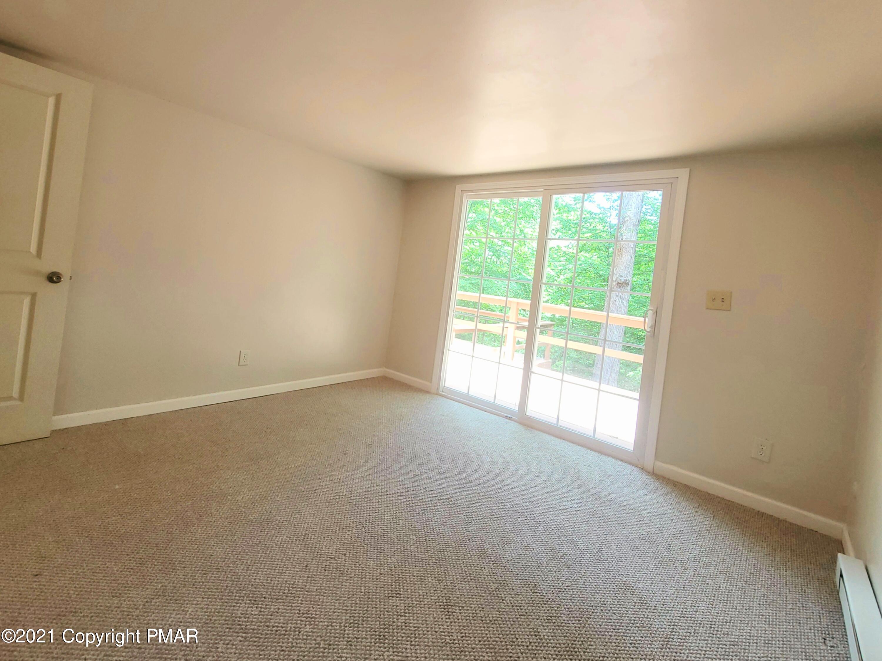 3153 Cherry Ridge Road Bushkill, PA 18324 - Photo 10 of 41 a view of an empty room with a window