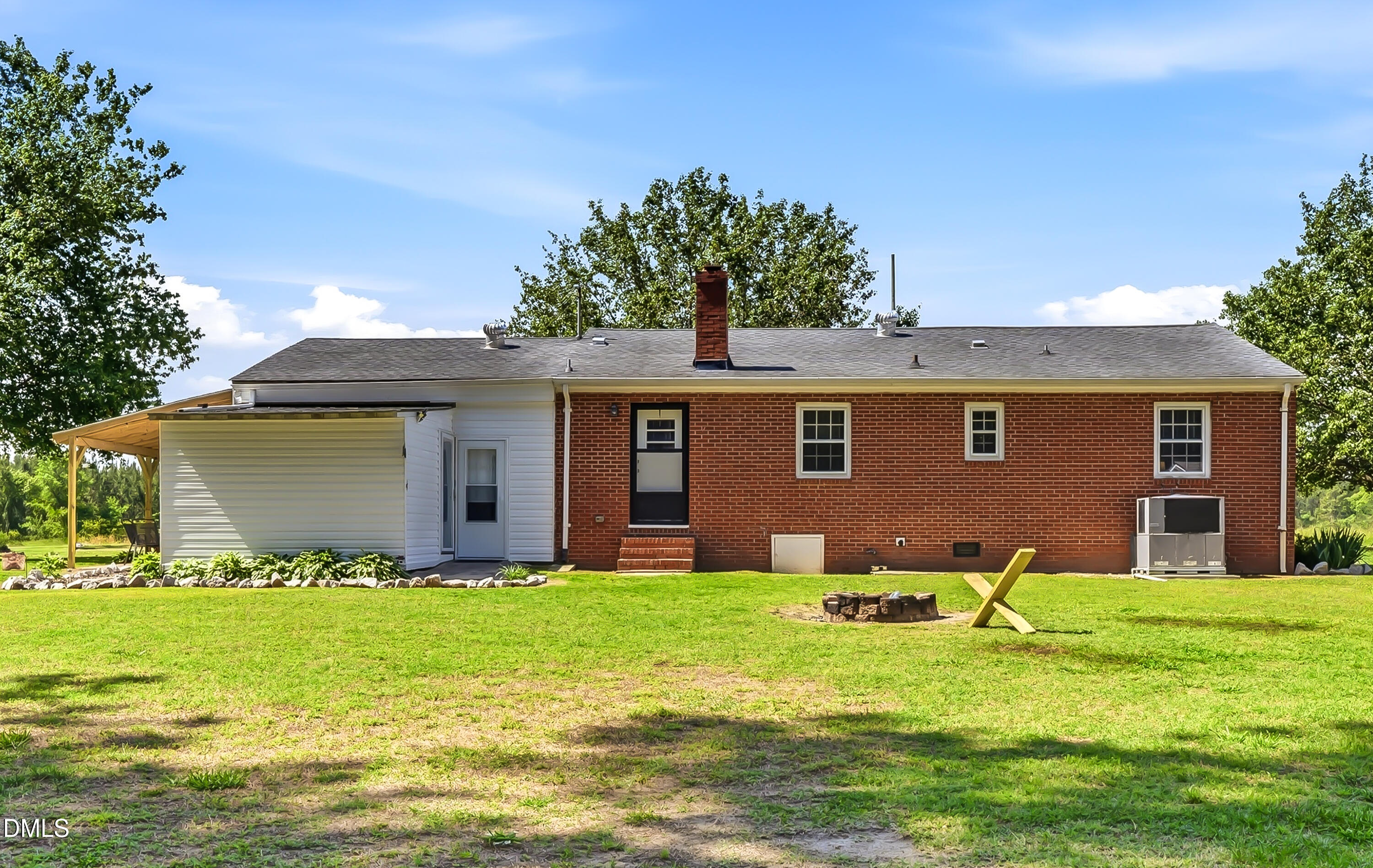 4967 Highway 581 Spring Hope, NC 27882 - Photo 8 of 44 a front view of house with yard and green space