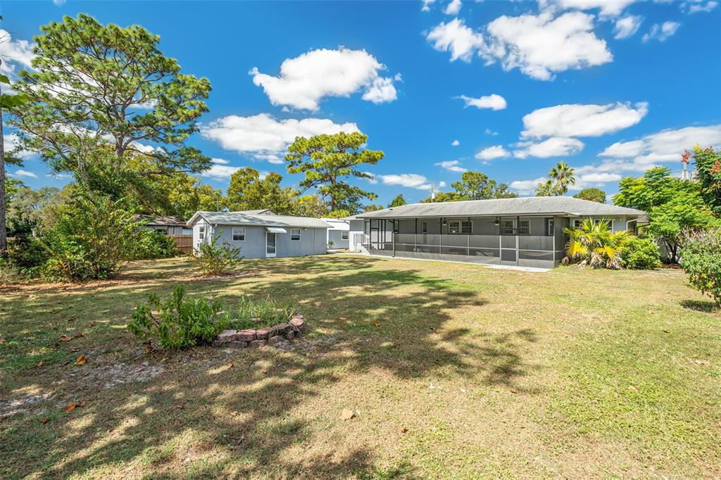 9738 Ray Street Hudson, FL 34669 - Photo 29 of 30 a front view of a house with a garden