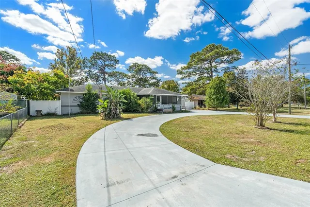 a view of outdoor space yard and swimming pool