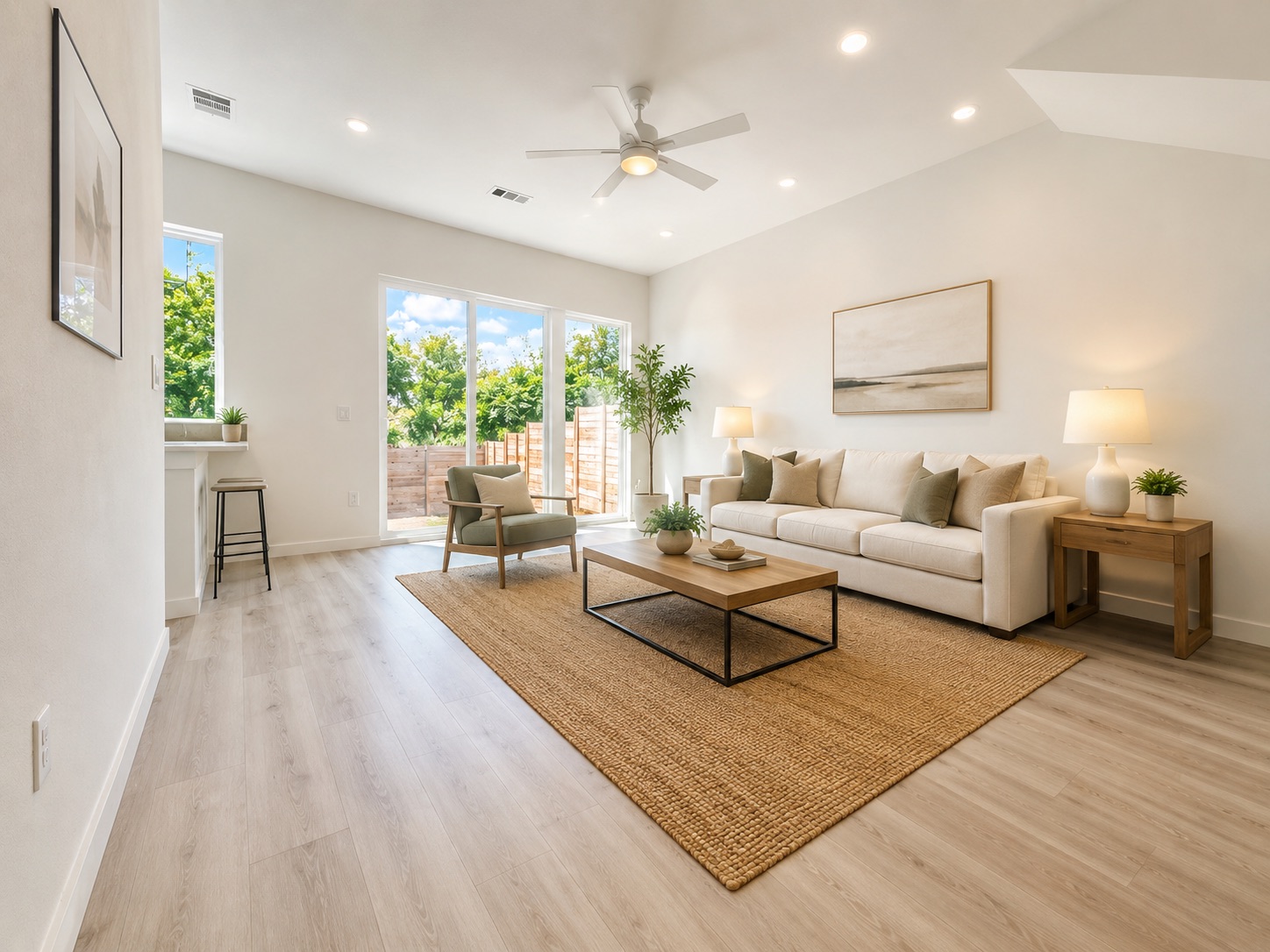 2000 Riverside Farms Road, Unit 6102 Austin, TX 78741 - Photo 6 of 11 Natural light floods this inviting living space with high ceilings and light-toned flooring.