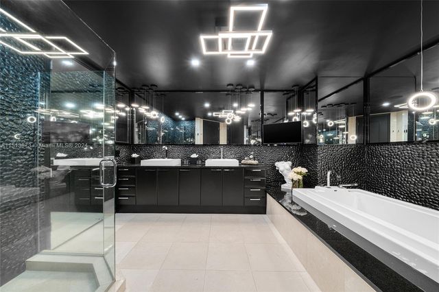 a large kitchen with a sink and counter space