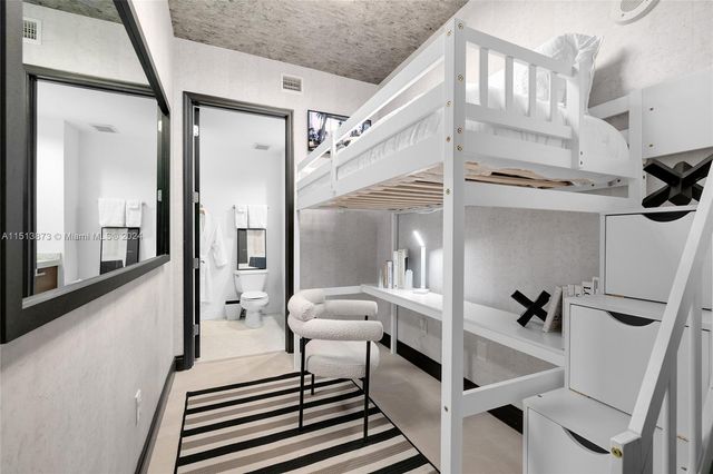 a view of a hallway with the glass door and furniture