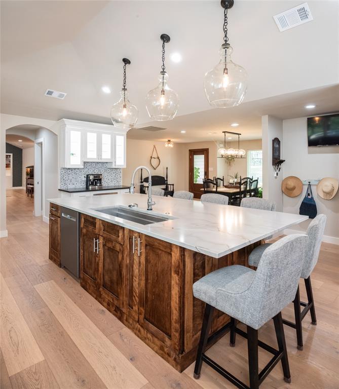 1451 Meandro Ria Lane Fairview, TX 75069 - Photo 10 of 38 a large kitchen with lots of counter space and sink