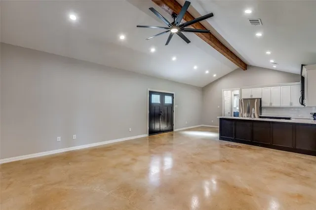 a view of workspace with wooden floor and window