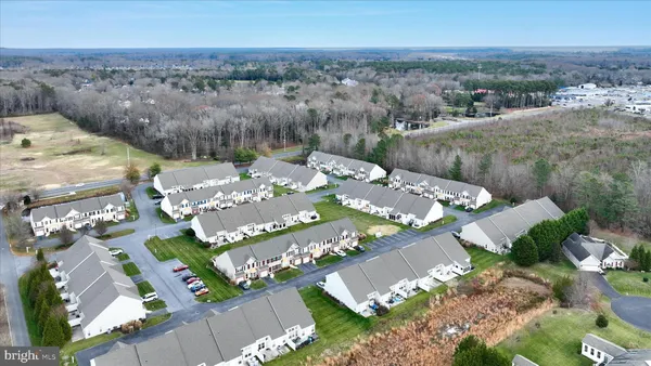 an aerial view of a house with a outdoor space