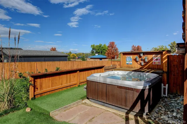a view of sitting area in front of house