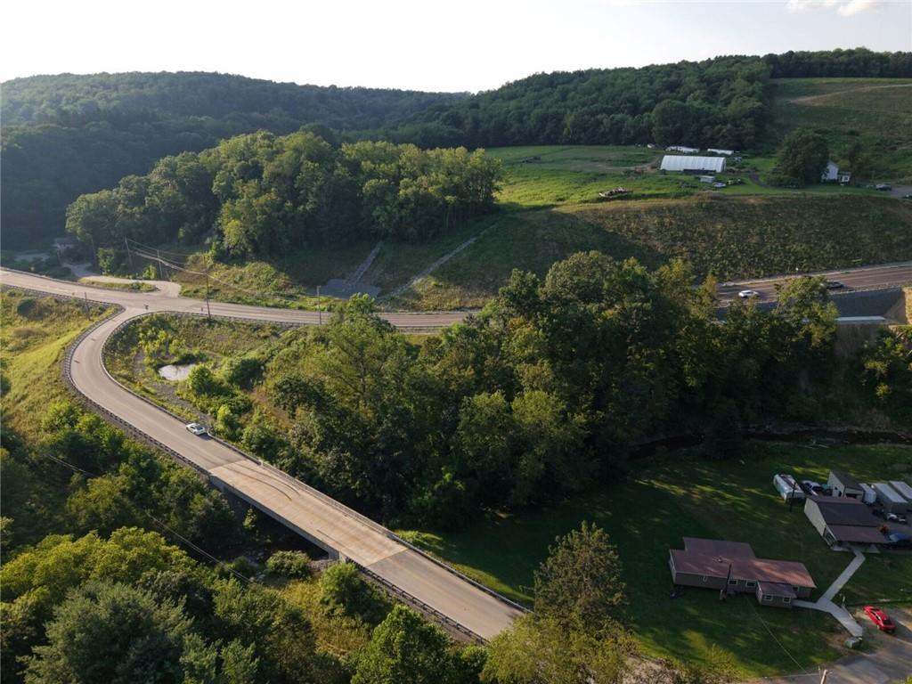 Lot 490 Freedom Crider Road Freedom, PA 15042 - Photo 2 of 11 a view of a lake with a yard
