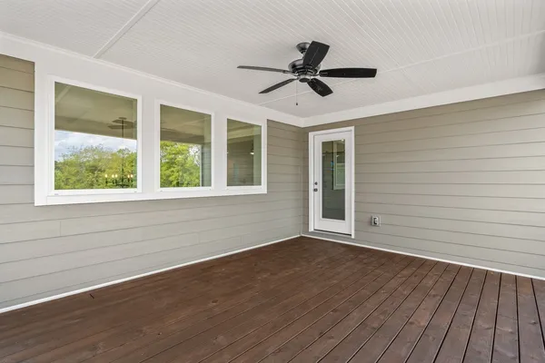 a view of a livingroom with furniture and fireplace