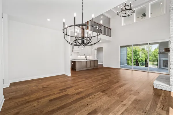 a open kitchen with cabinets a sink and appliances