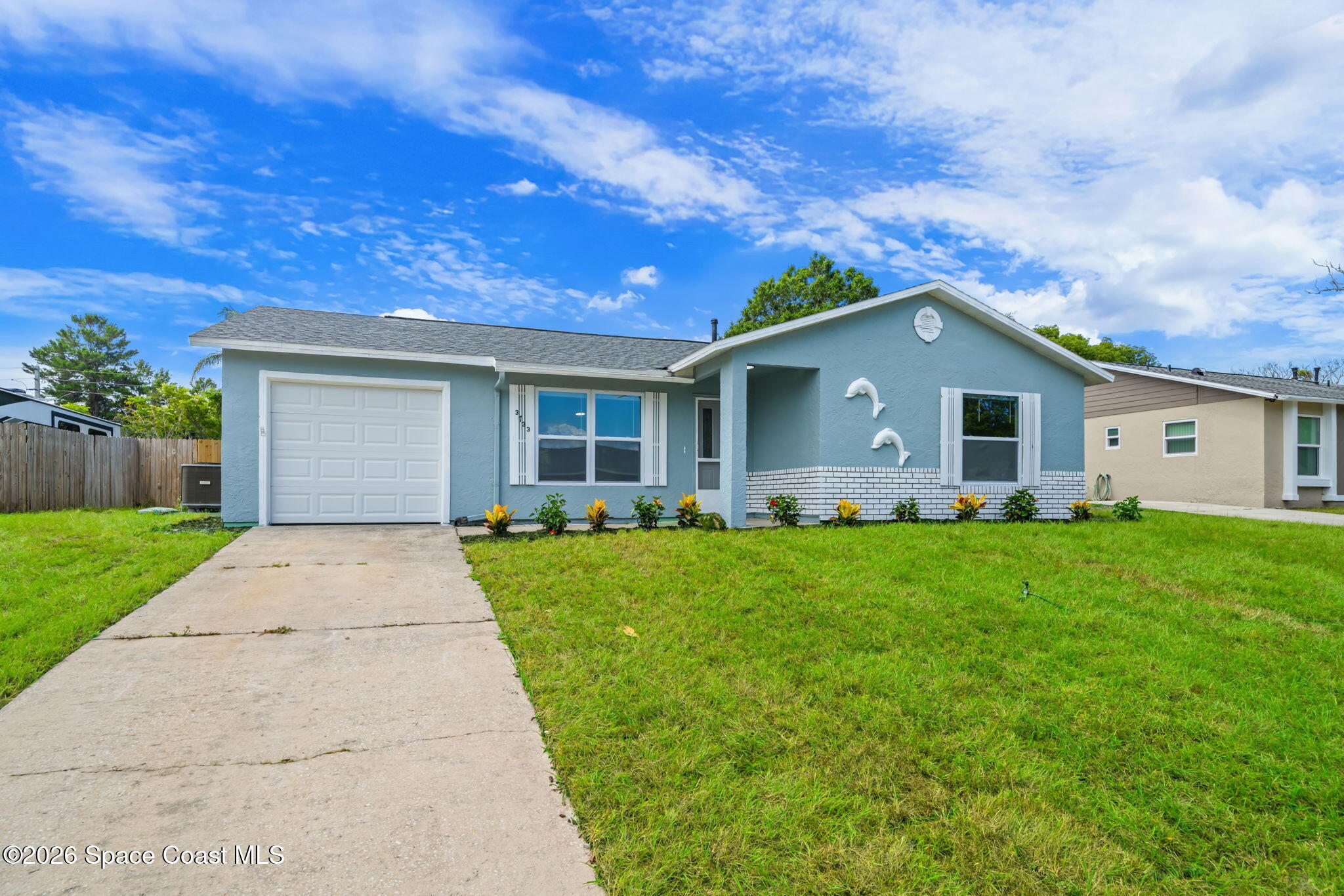3733 West Powder Horn Road Titusville, FL 32796 - Photo 1 of 26 23-web-or-mls-3733-w-powder-horn-rd