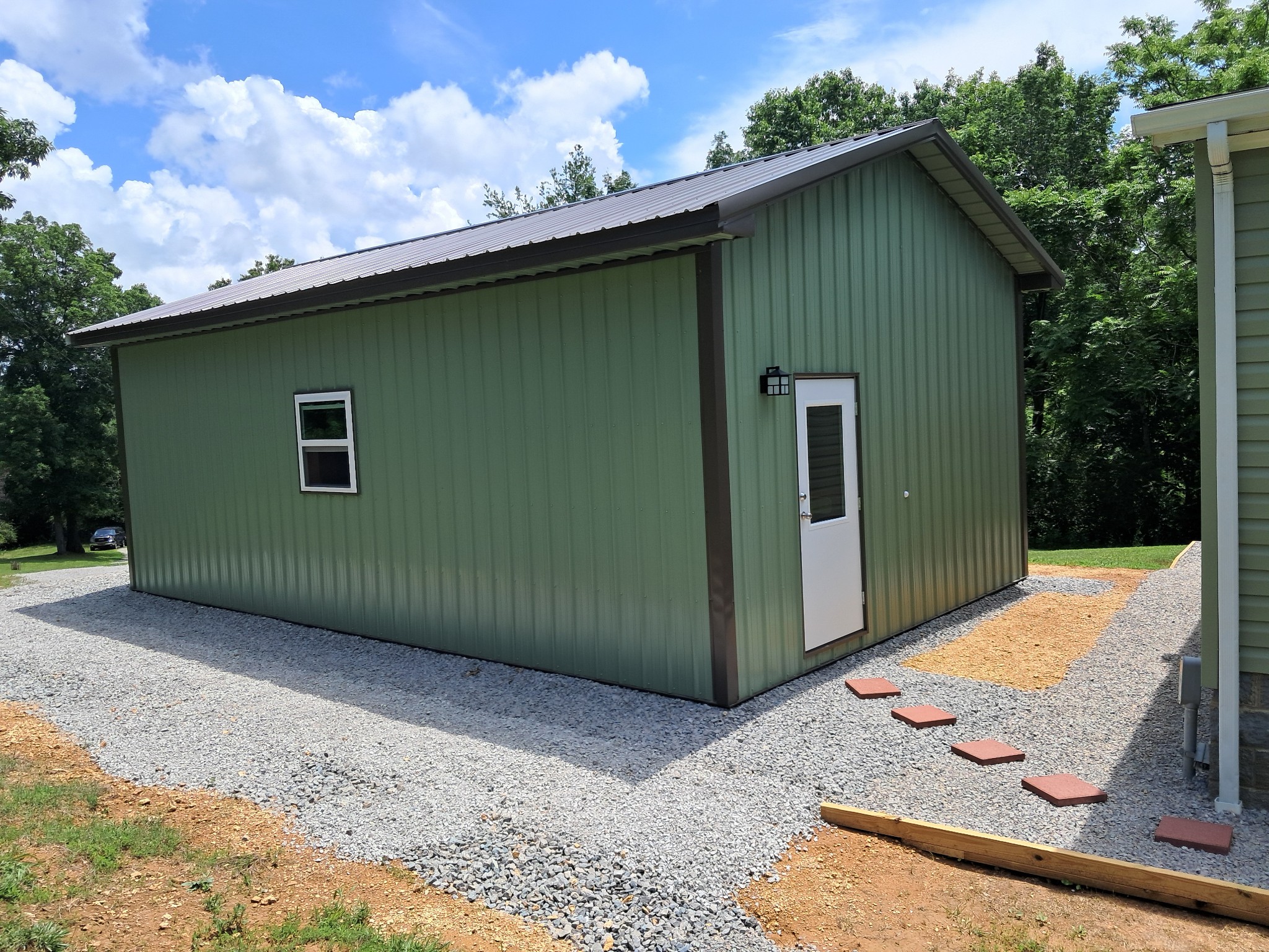 5525 Wiley Hollow Road Culleoka, TN 38451 - Photo 12 of 64 a front view of a house with garden