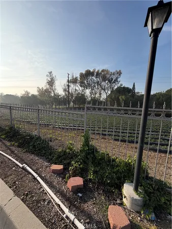 a view of a backyard with sitting area