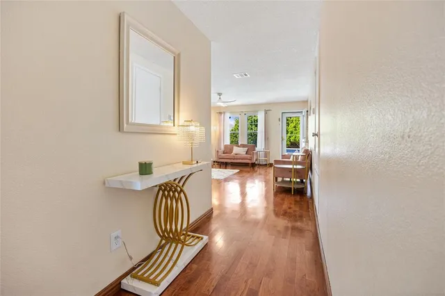 a view of livingroom with furniture and wooden floor