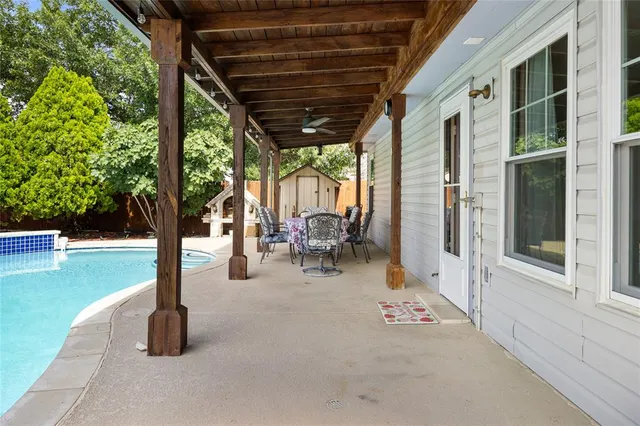 a view of a porch with seating space