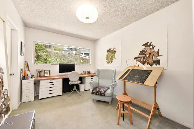 a room with furniture and a window