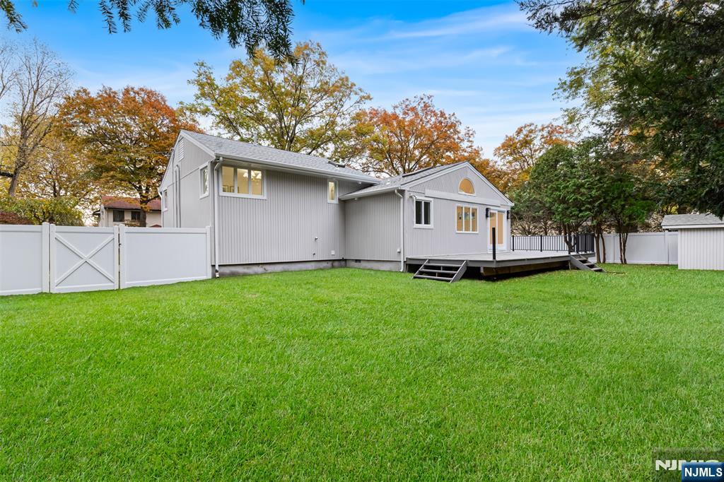 7 Chestnut Place Ho-Ho-Kus, NJ 07423 - Photo 35 of 36 a view of an house with backyard and garden