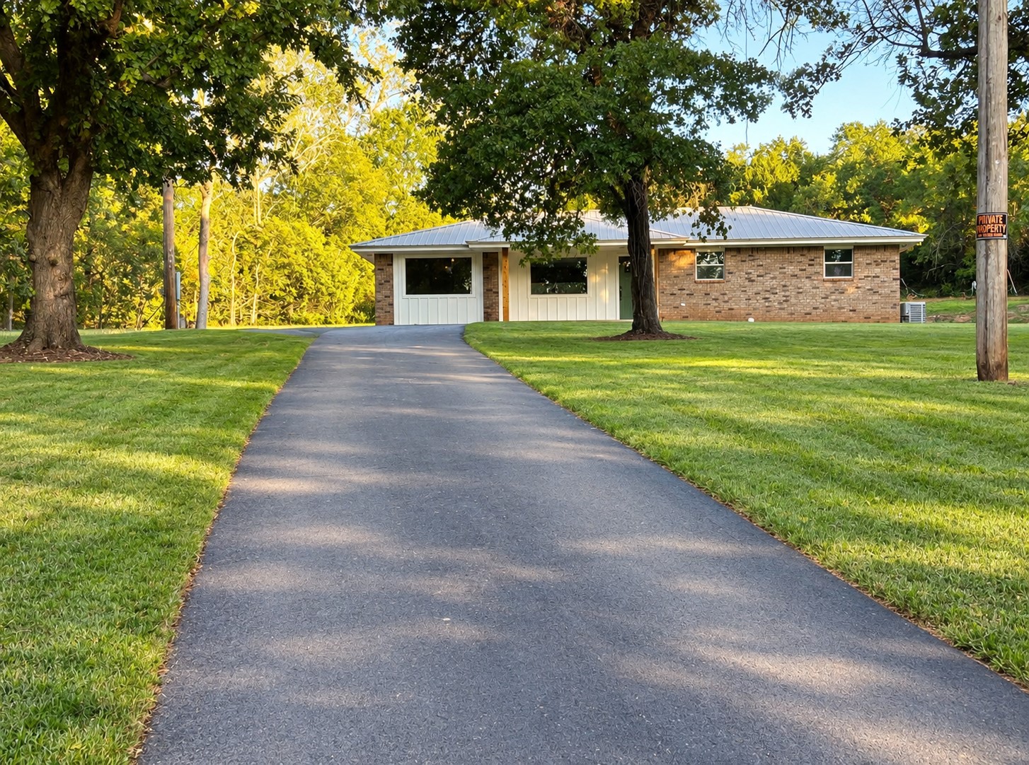900062 South 3320 Road Wellston, OK 74881 - Photo 1 of 11 Brick and panel siding exterior with a metal roof