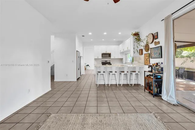a bathroom with a sink toilet and mirror