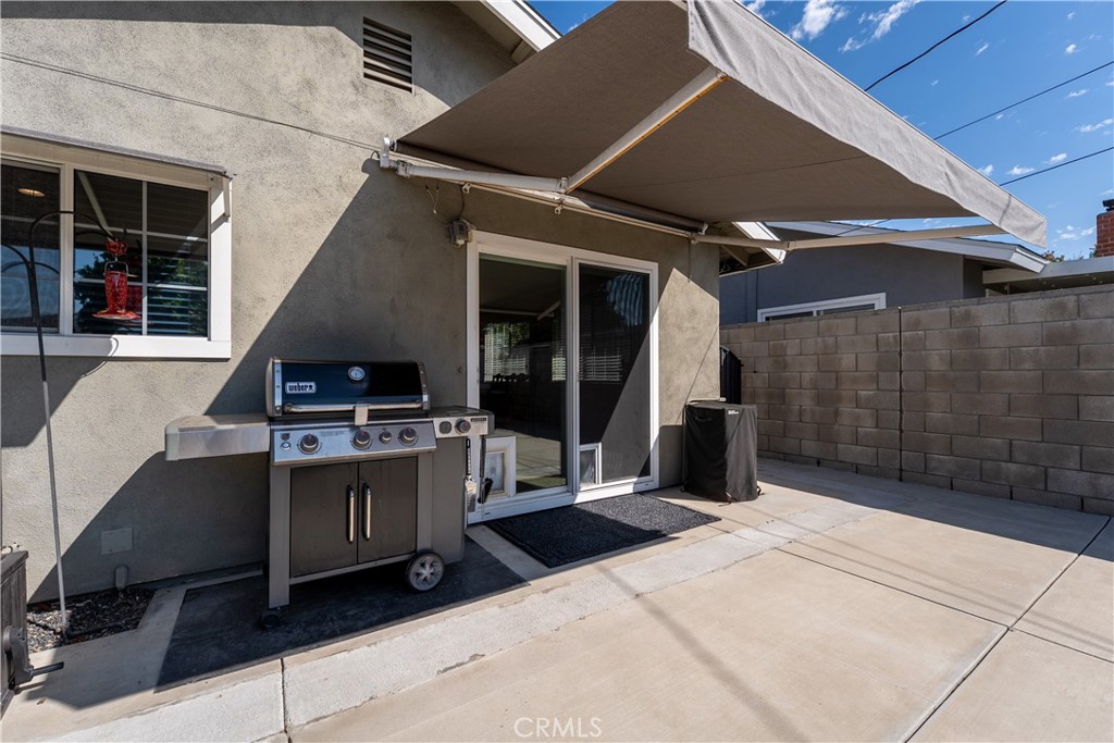 390 North Milford Road Orange, CA 92867 - Photo 59 of 70 Sliding room door off of kitchen dining area out to backyard towards the Spa.