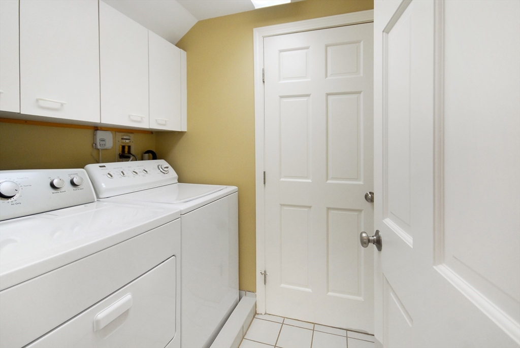 12 South Meadow Ridge, Unit 12 Concord, MA 01742 - Photo 28 of 38 a utility room with dryer and washer
