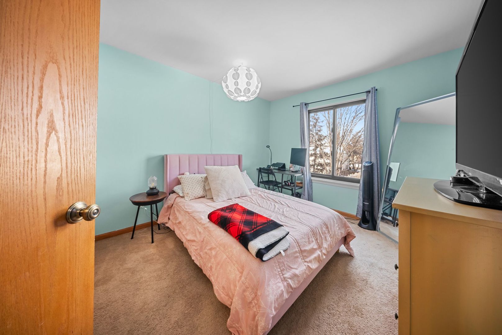 1960 Tuscany Lane Romeoville, IL 60446 - Photo 11 of 24 a bedroom with a bed and a table in it