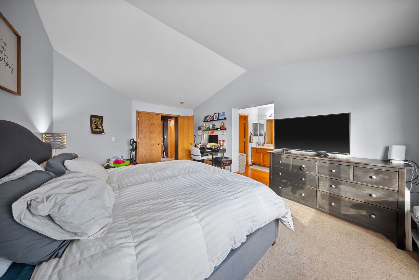 1960 Tuscany Lane Romeoville, IL 60446 - Photo 18 of 24 a bedroom with a bed and a flat screen tv