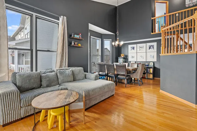 a living room with furniture and a table