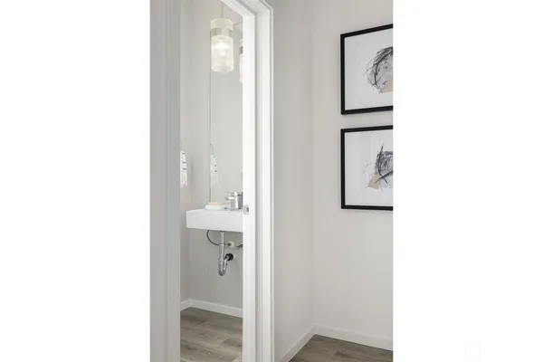 a bathroom with a shower and a sink