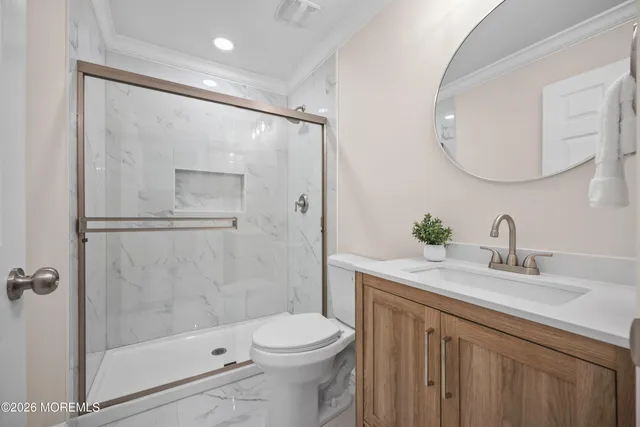 an empty room with a empty space and windows