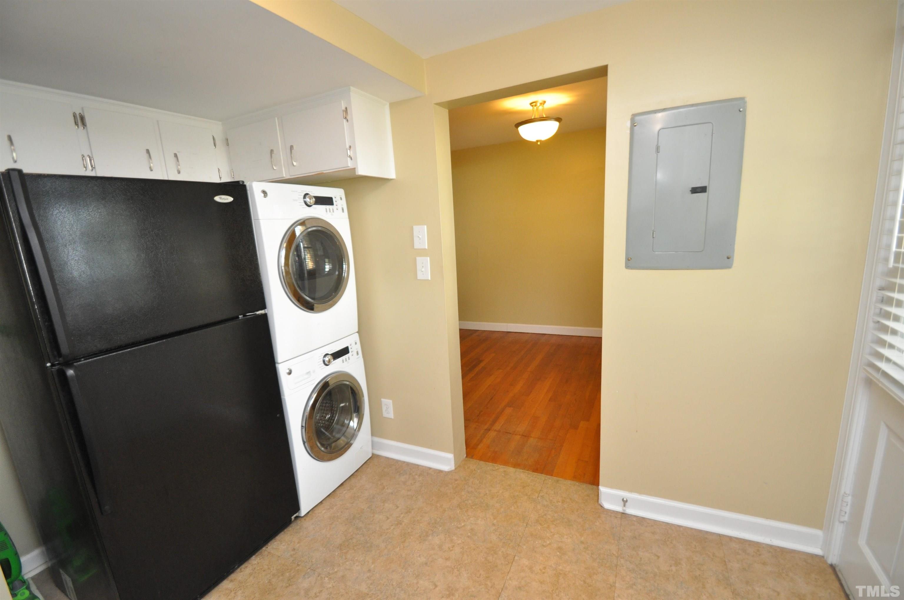 1603 Sutton Drive, Unit 2 Raleigh, NC 27605 - Photo 9 of 22 a utility room with dryer and washer
