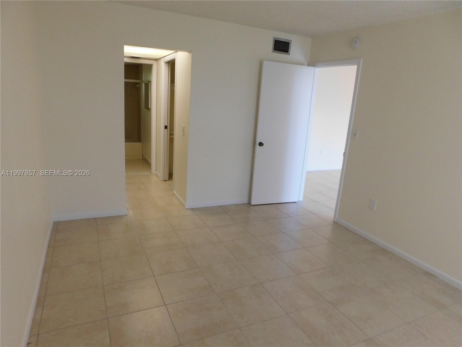 8065 Southwest 107th Avenue, Unit 321 Miami, FL 33173 - Photo 12 of 19 a view of a room with an empty space