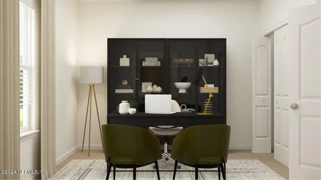 a living room with furniture and a lamp