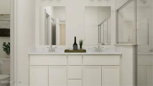 a bathroom with a shower curtain and a sink